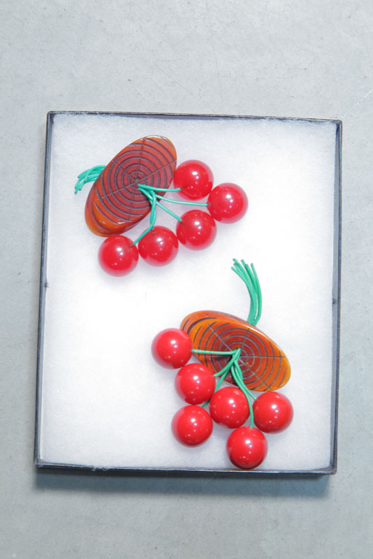 Appraisal: TWO BAKELITE PINS Both with cherries and tree pattern pin