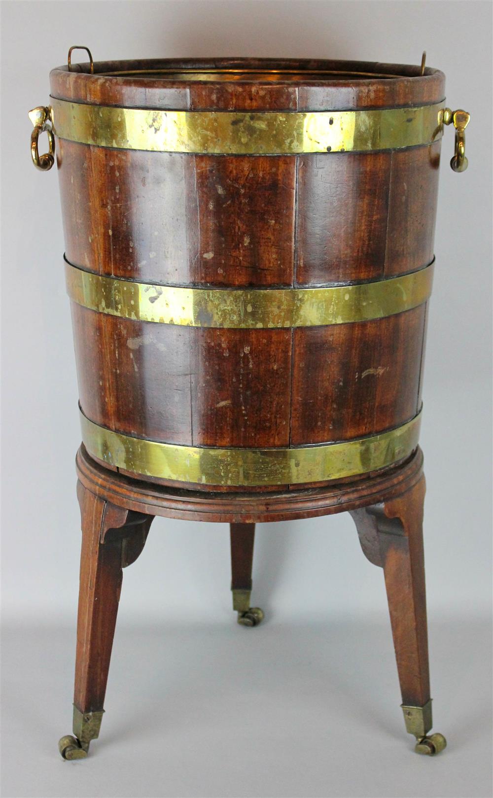 Appraisal: GEORGE III BRASS BOUND MAHOGANY PAIL ON STAND of cylindrical