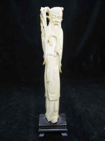 Appraisal: Carved Ivory Figurine of a Scholar '' tall with wooden