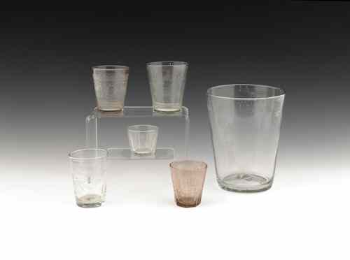 Appraisal: Five etched colorless glass cups th th c together with