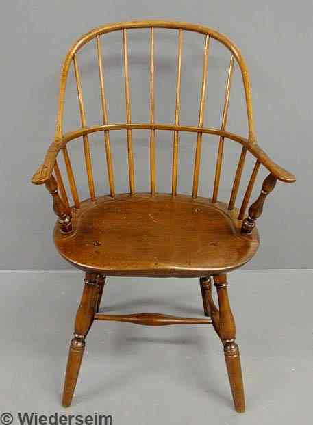 Appraisal: Sack-back Windsor armchair early th c with baluster turned arm