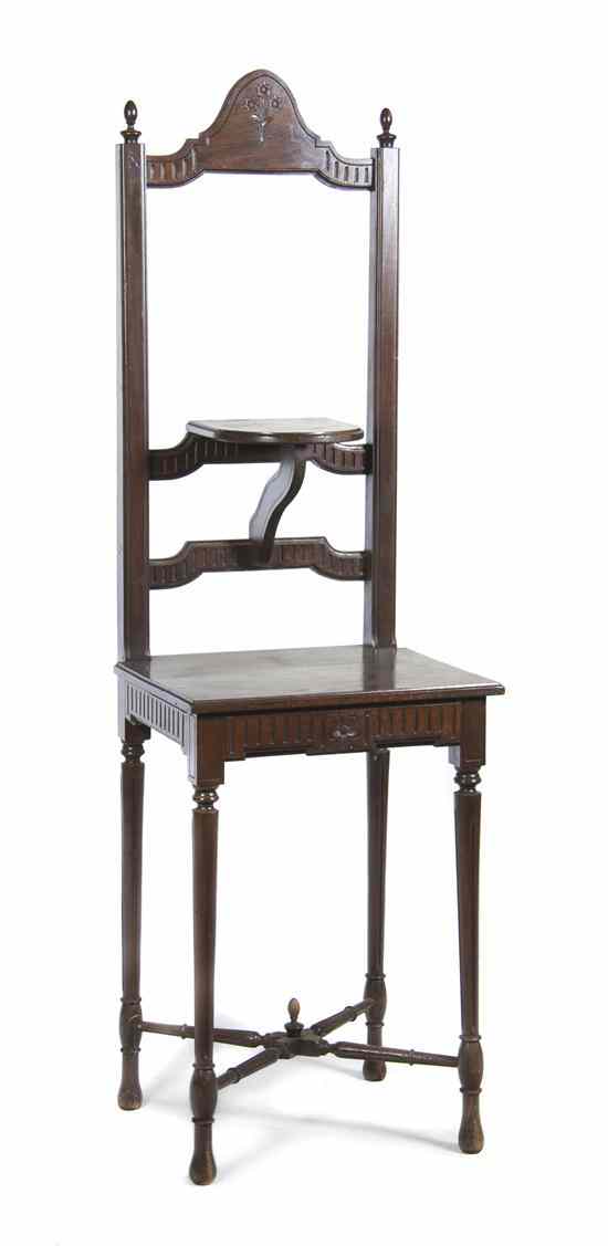 Appraisal: A Mahogany Wash Stand having a shaped crest over a