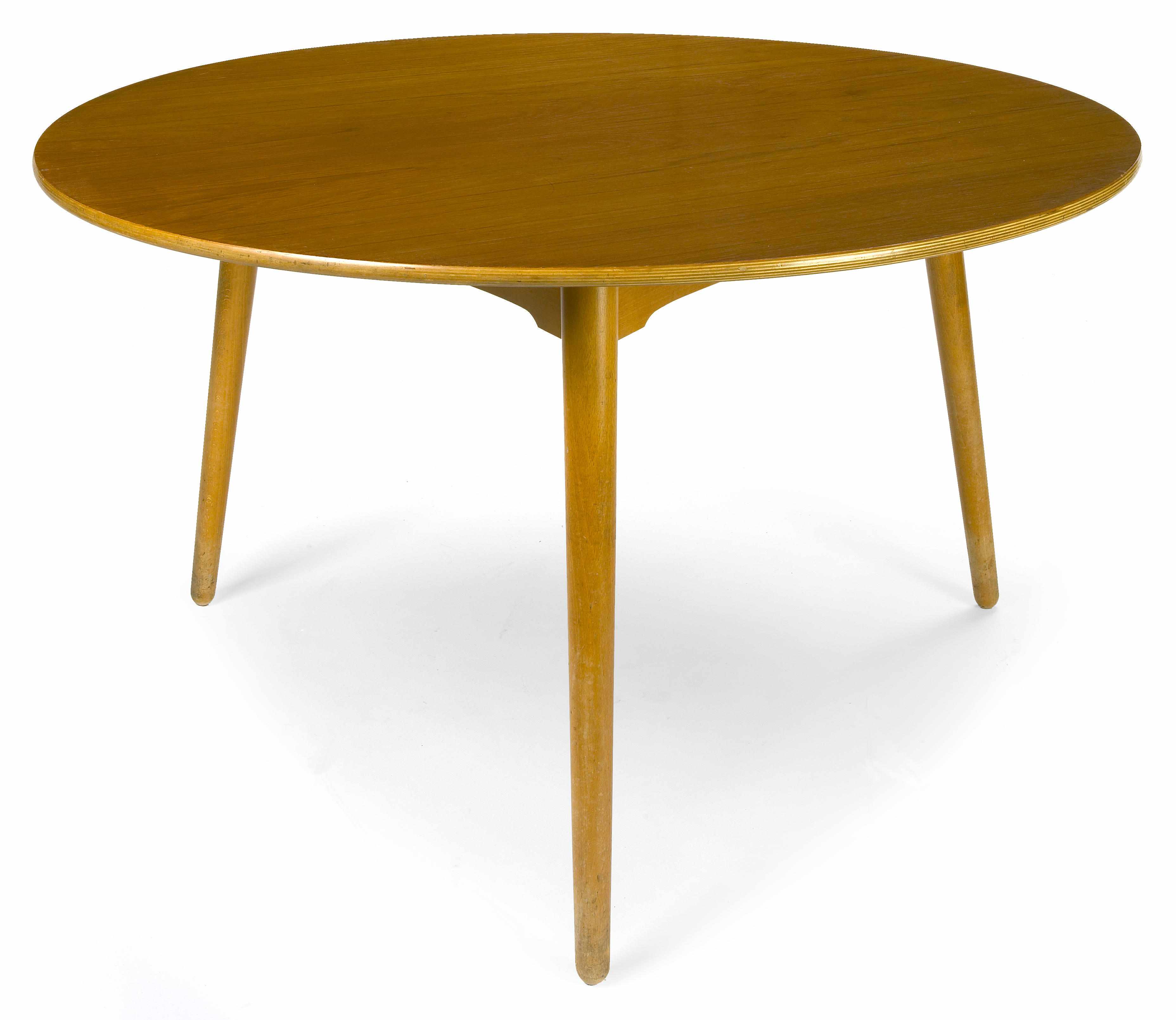 Appraisal: A Hans Wegner teak and beech dining table and six