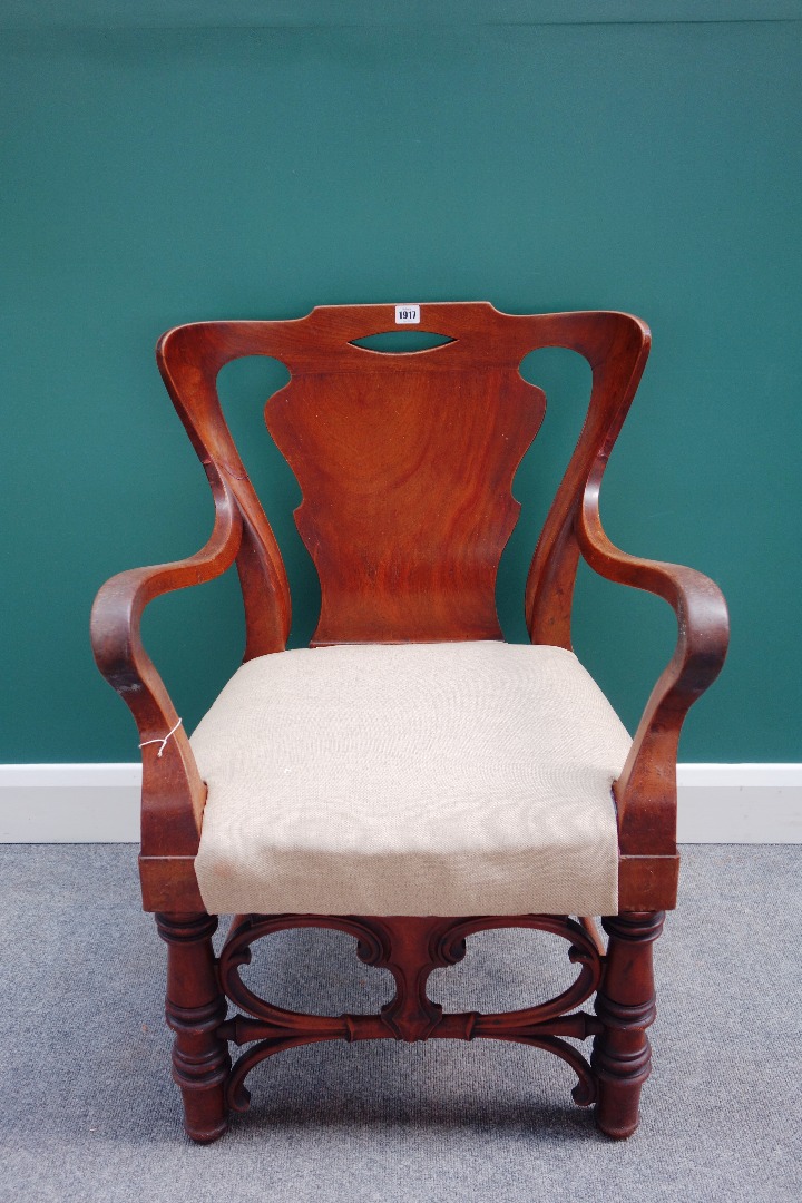 Appraisal: A th century North European walnut framed open armchair on