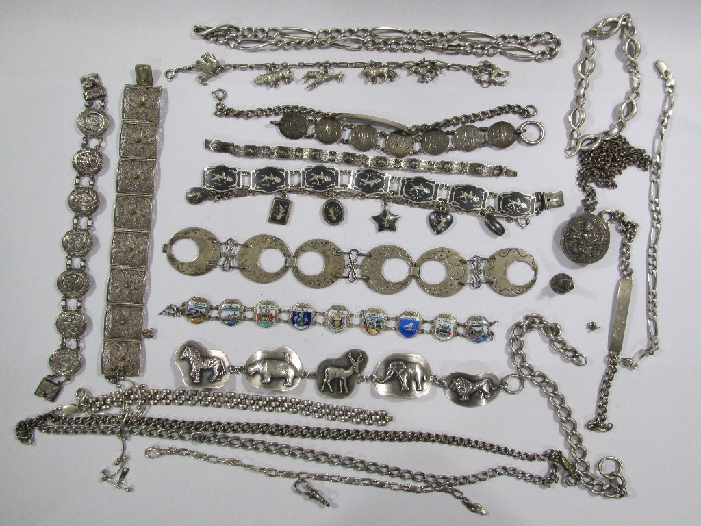 Appraisal: Lot of silver items to include Siamese bracelets Indian god