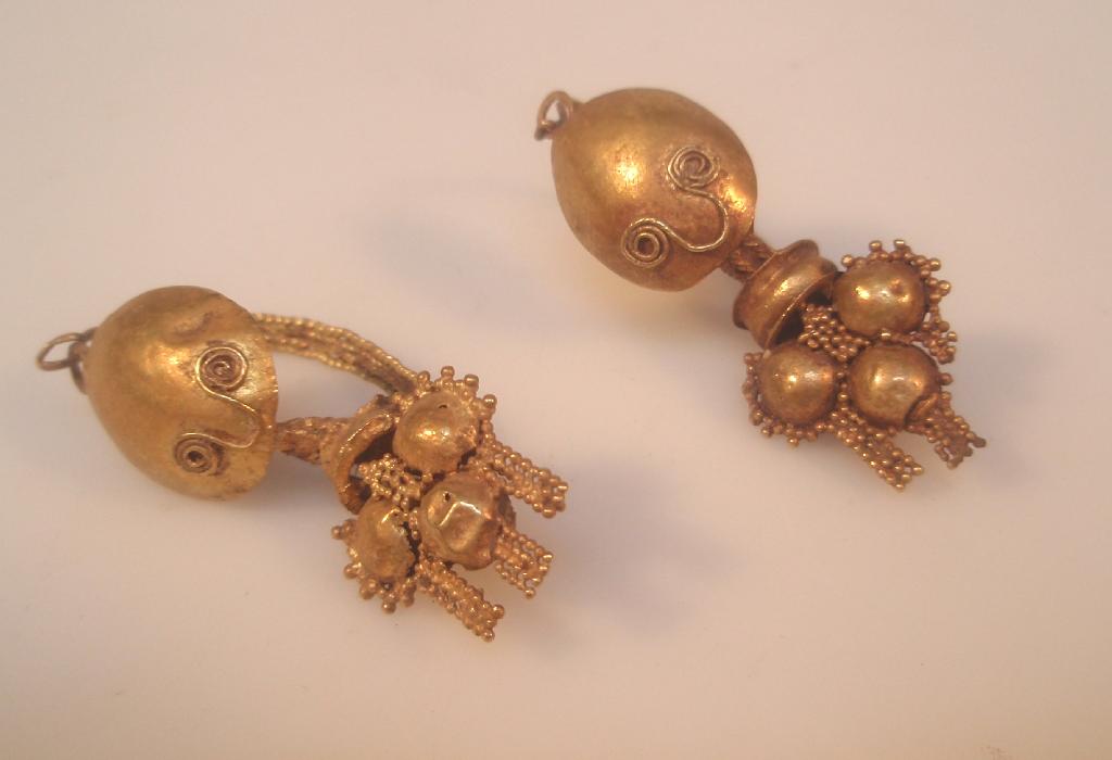 Appraisal: A pair of Roman gold earrings with a frontal domed