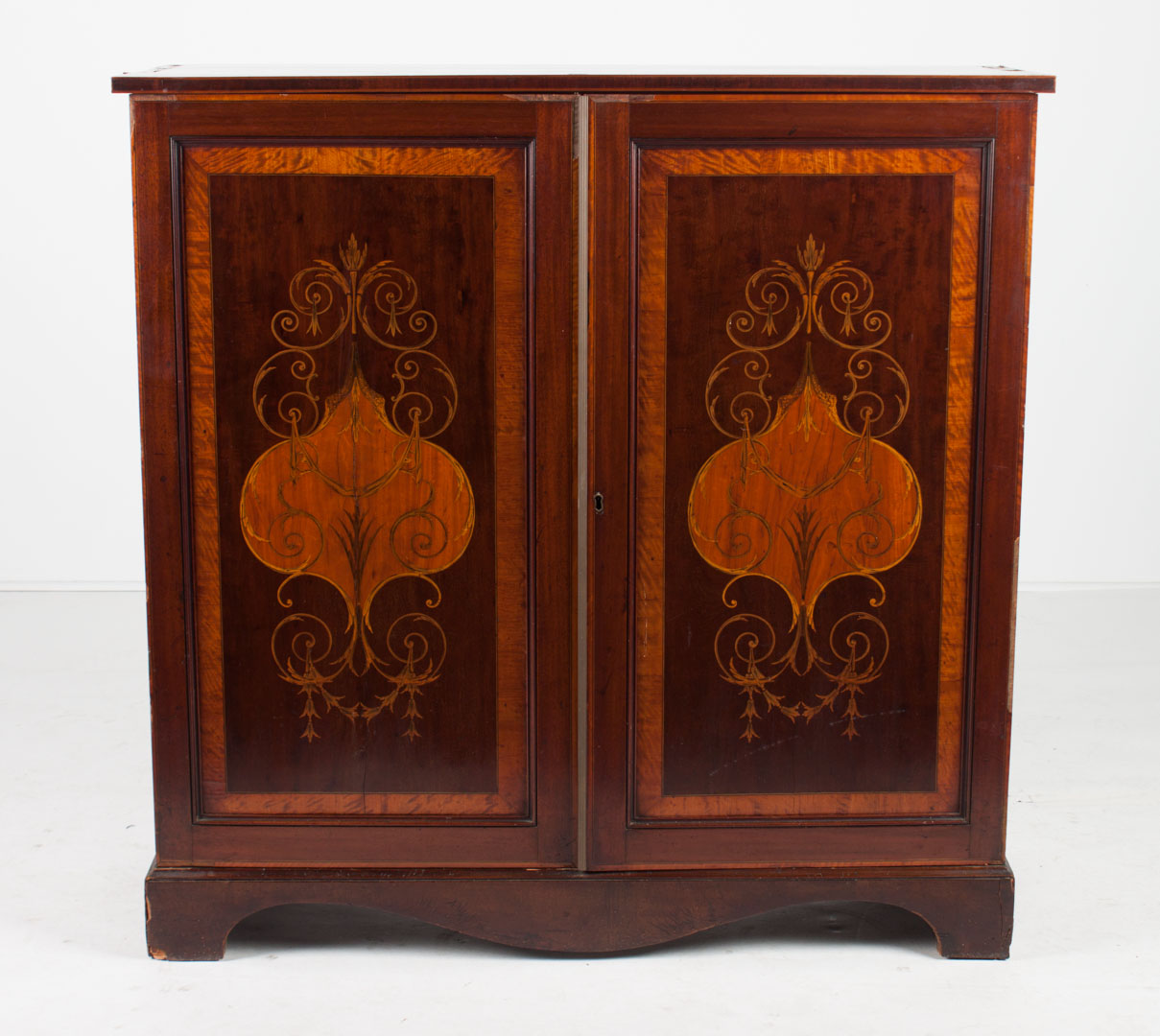 Appraisal: Edwardian inlaid mahogany dressing cabinet circa banded and elaborate scroll