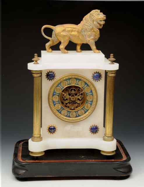 Appraisal: A FRENCH WHITE ALABASTER MANTEL CLOCK with lion surmount column