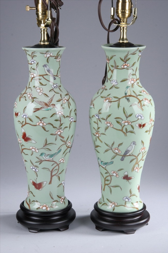 Appraisal: PAIR CHINESE FAMILLE VERTE VASES Bird butterfly and flowering prunus