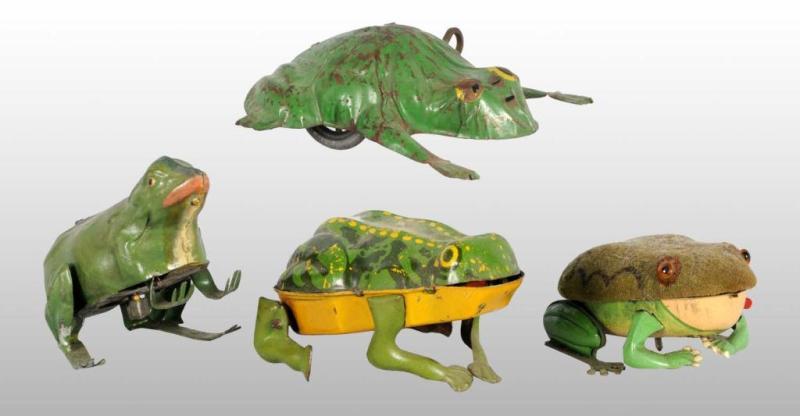 Appraisal: Lot of Tin Frog Wind-Up Toys Description German Working Includes