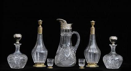 Appraisal: PAIR OF FRENCH SILVER-GILT AND ENGRAVED GLASS DECANTERS AND STOPPERS