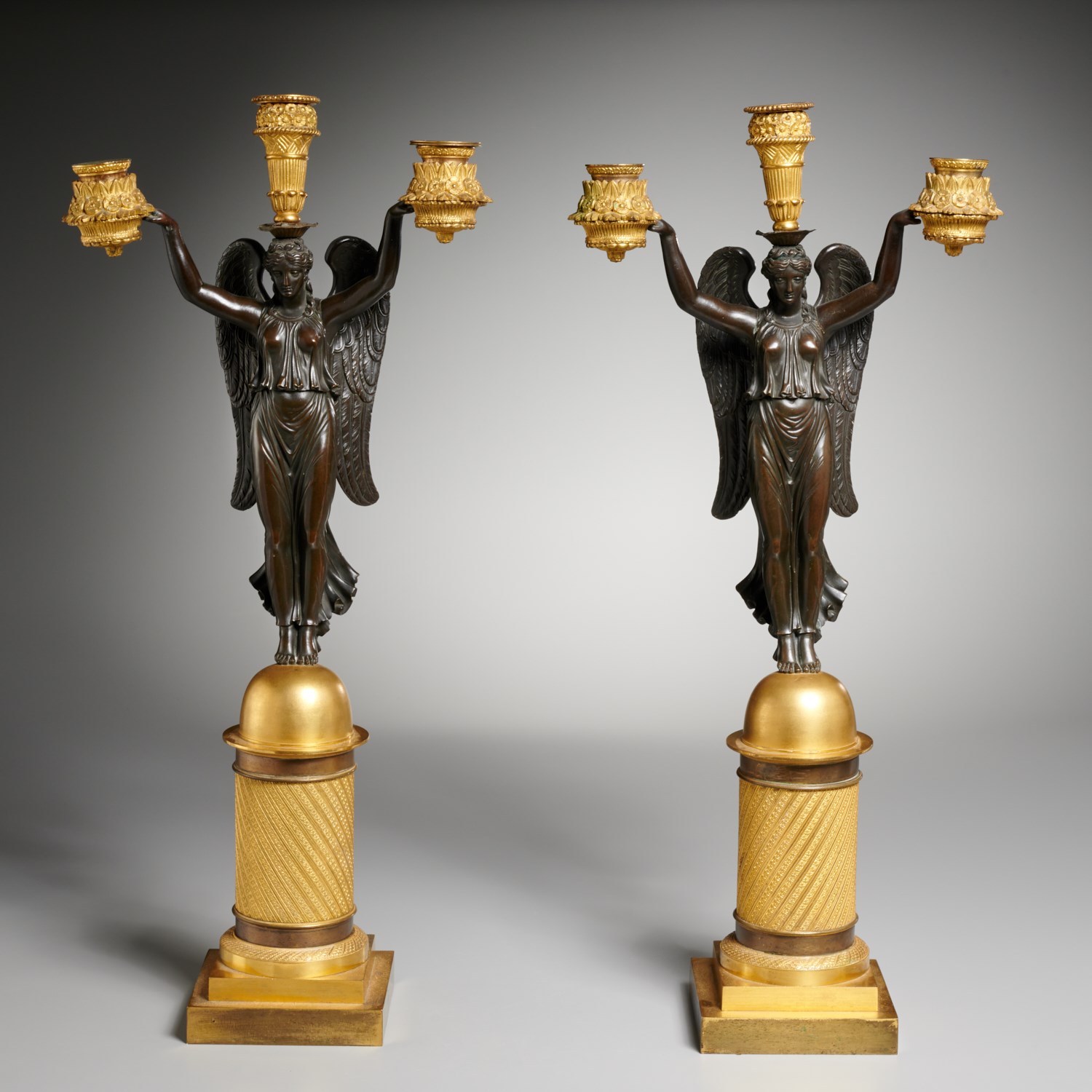 Appraisal: PAIR FRENCH EMPIRE BRONZE -ARM CANDELABRA th c France dark