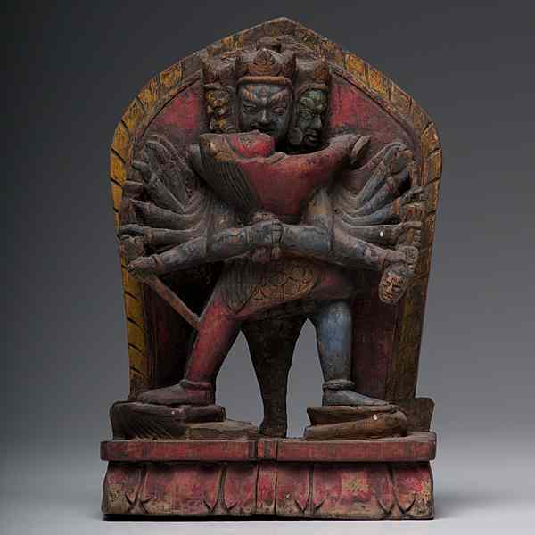 Appraisal: Tibetan Carved Deity Tibetan a carved and polychrome painted wooden