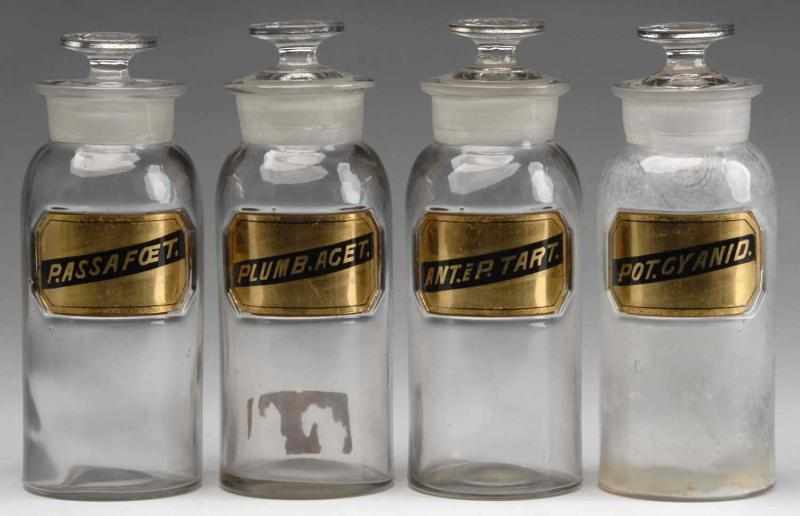 Appraisal: Lot of Glass Label Druggist Shop Bottles Description Matching set