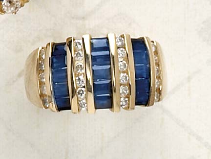 Appraisal: SAPPHIRE AND DIAMOND RING k yellow gold ring with fifteen