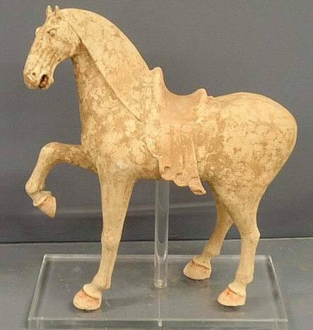 Appraisal: Tang Dynasty pottery prancing horse with saddle h x l