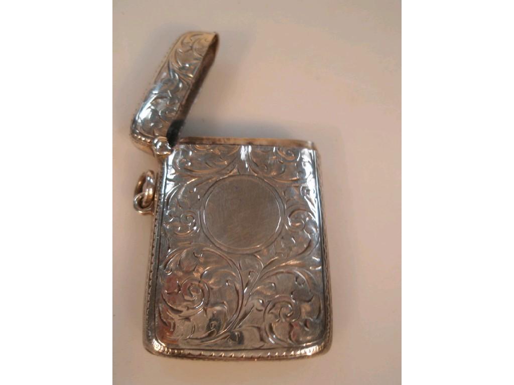 Appraisal: An Edward VII silver vesta case engraved with foliate scrolls