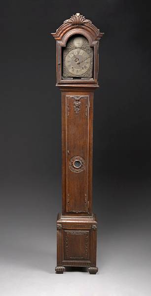 Appraisal: A Continental oak and brass repousse tall case clock mid