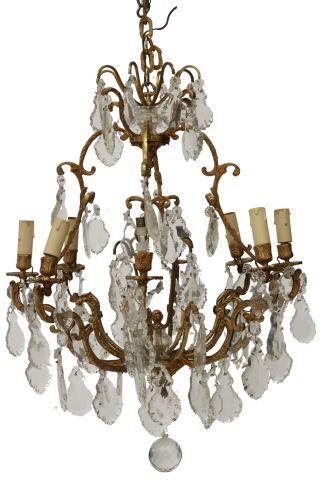 Appraisal: Italian gilt metal and crystal eight-light chandelier early th c