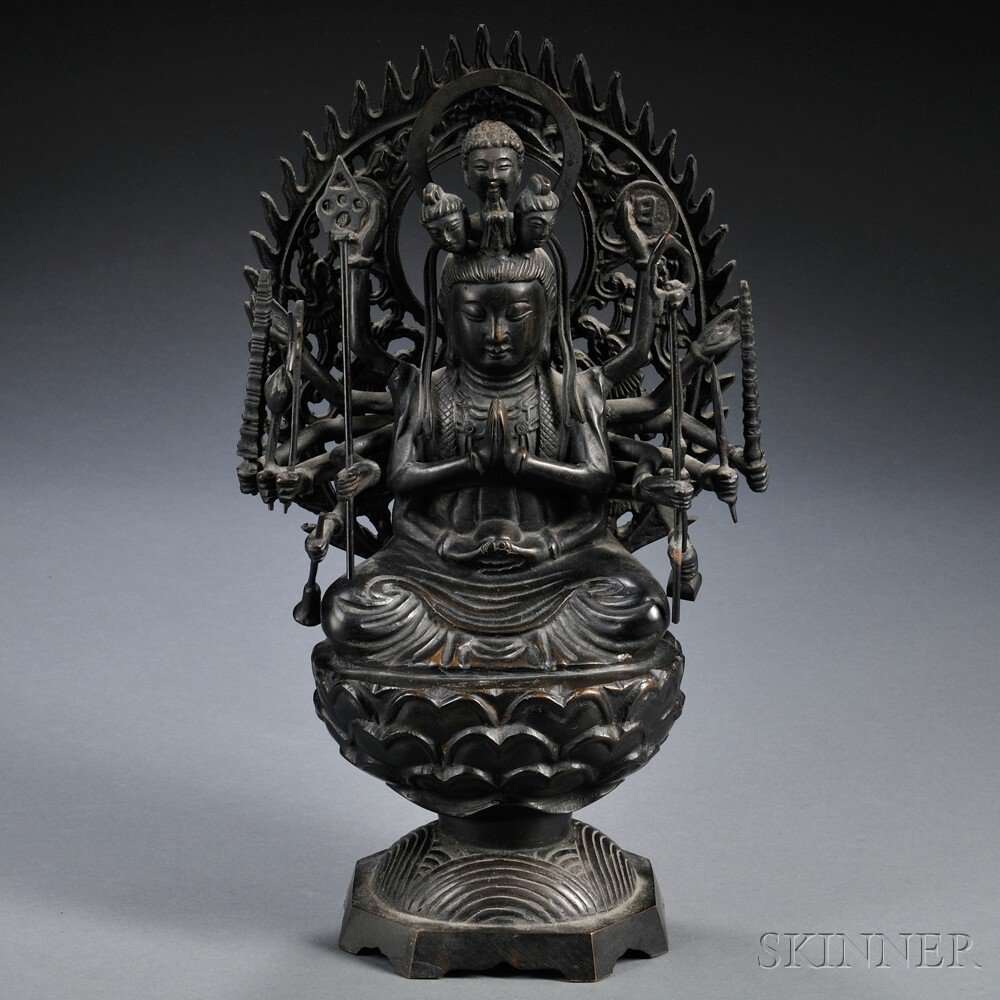 Appraisal: Bronze Buddha China th century with sixteen arms holding various