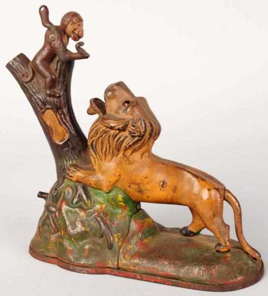 Appraisal: Cast Iron Lion Monkeys Mechanical Bank Manufactured by Kyser Rex