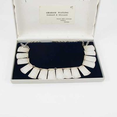 Appraisal: By Graham Watling a modern necklace with a row of