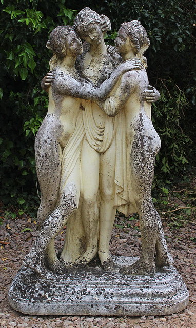 Appraisal: A RECONSTITUTED MARBLE GARDEN FIGURE OF THE THREE GRACES standing