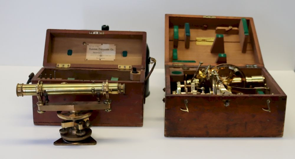 Appraisal: Two Vintage Optical Scientific Instruments A polished cased surveyor's transit