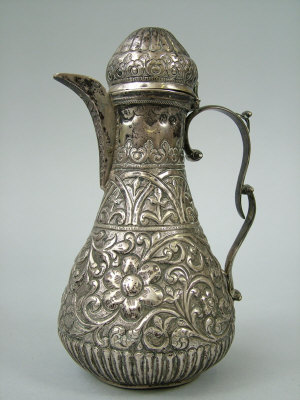 Appraisal: A Egyptian white metal coffee pot of tapering baluster form