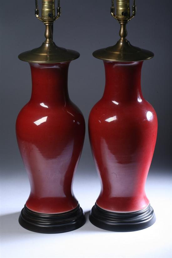 Appraisal: PAIR CHINESE COPPER RED PORCELAIN VASES Electrified - in high