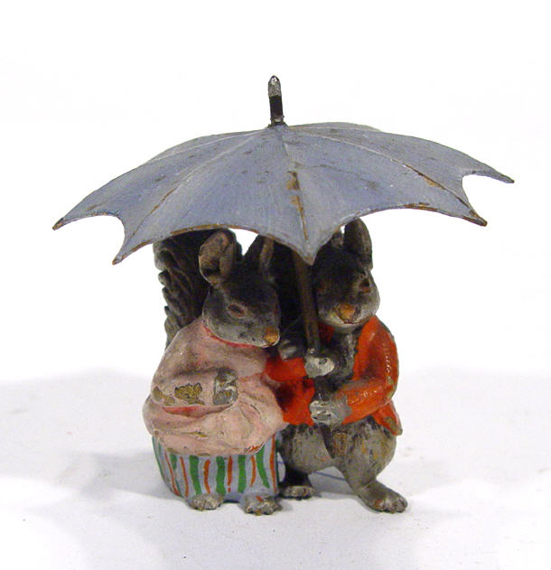 Appraisal: Cold painted bronze group of two squirrels in dress under