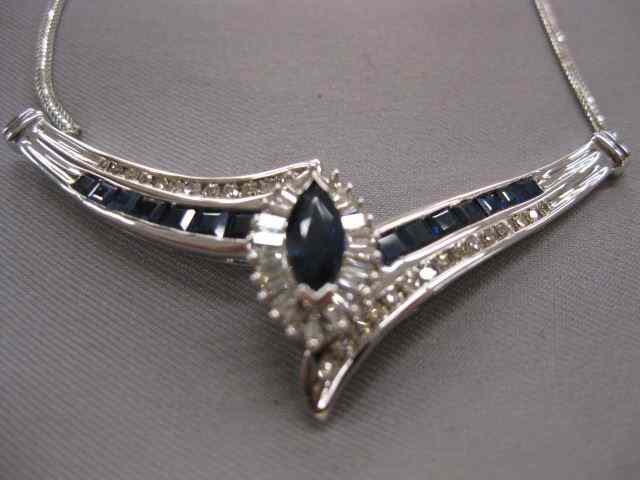 Appraisal: Sapphire Diamond Necklace deep blue gems surrounded by diamonds carat