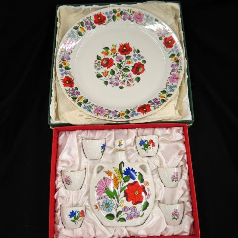 Appraisal: Kalocsa Hungarian Porcelain Whiskey Set charger in boxes excellent