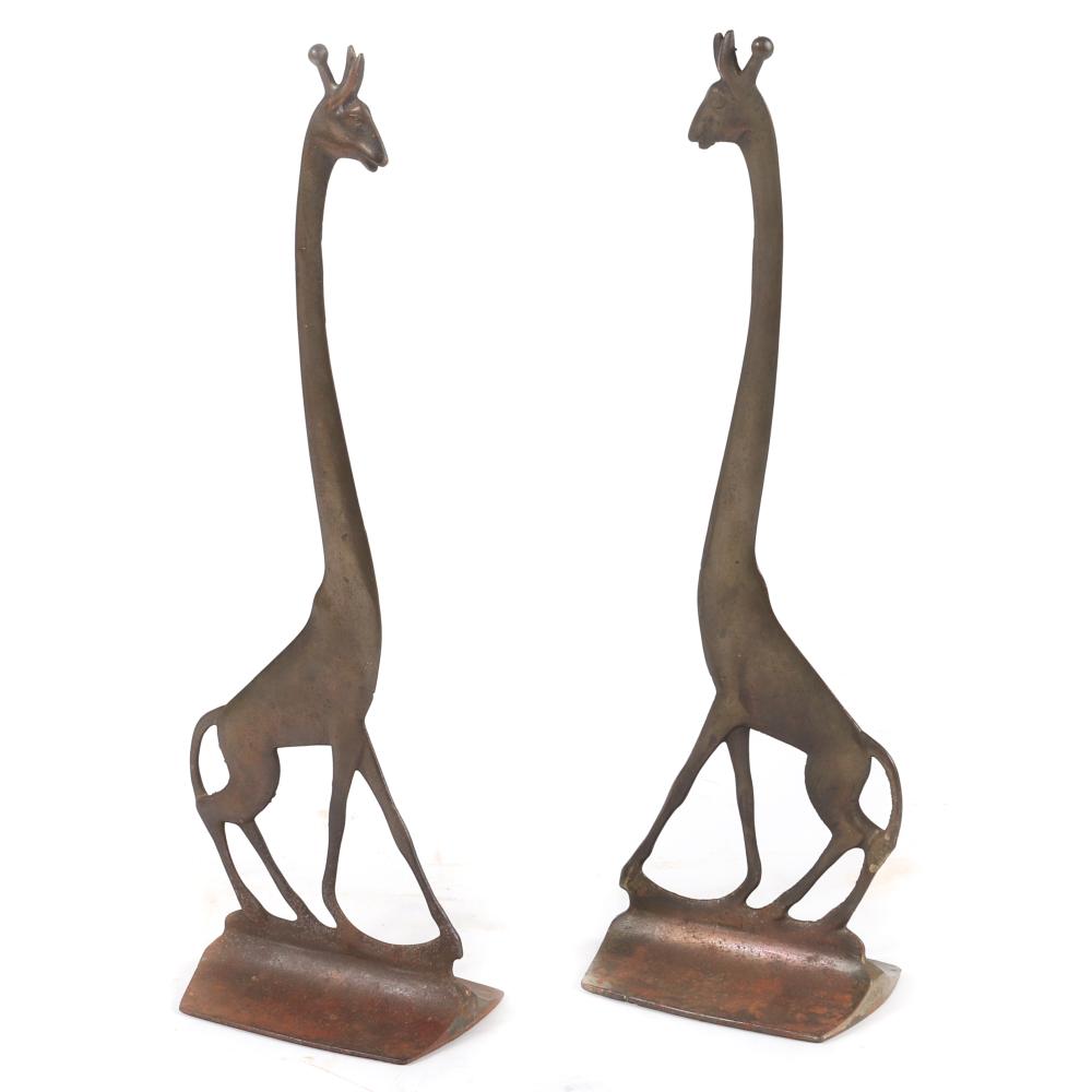 Appraisal: PAIR ART DECO BRONZE GIRAFFE FIGURAL STYLIZED ANIMAL DOORSTOPS H