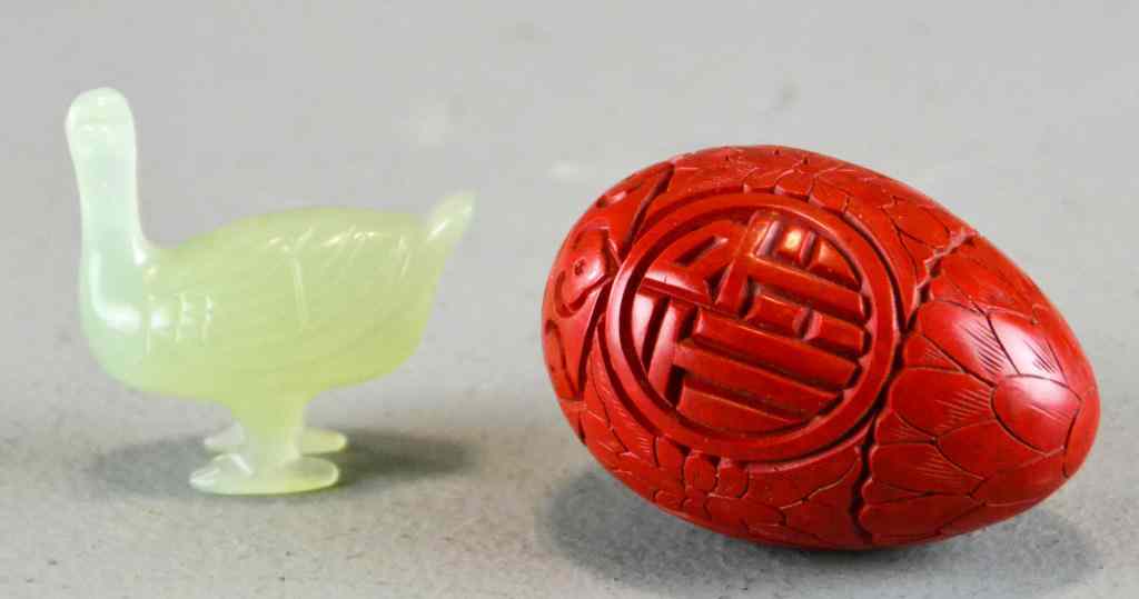 Appraisal: Chinese Jade Carved Duck and Cinnabar EggIncluding carved and finely