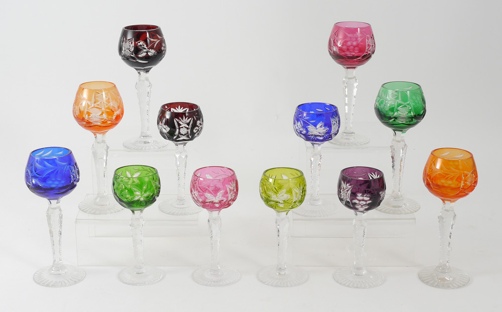 Appraisal: SET OF MULTI COLOR CUT TO CLEAR CORDIALS Cut crystal