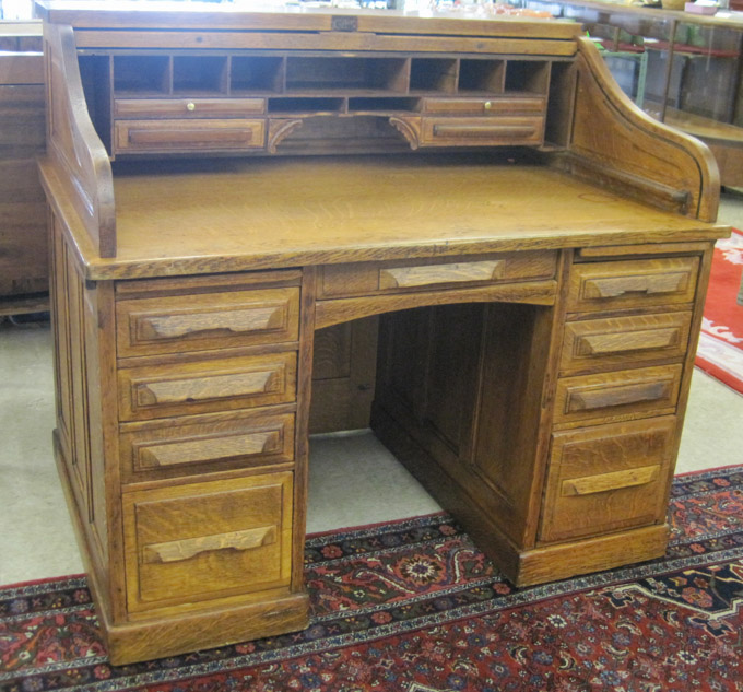 Appraisal: AN OAK ROLL-TOP DESK Abner Cutler Son Buffalo New York