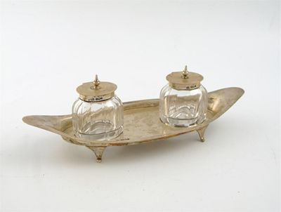 Appraisal: An Edwardian silver double inkstand by H Atkin Sheffield oval