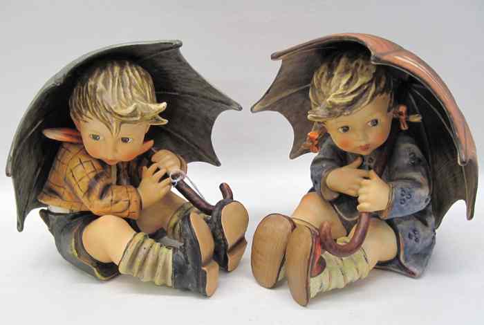 Appraisal: PAIR OF GERMAN HUMMEL FIGURINES ''Umbrella Boy '' HUM IIA