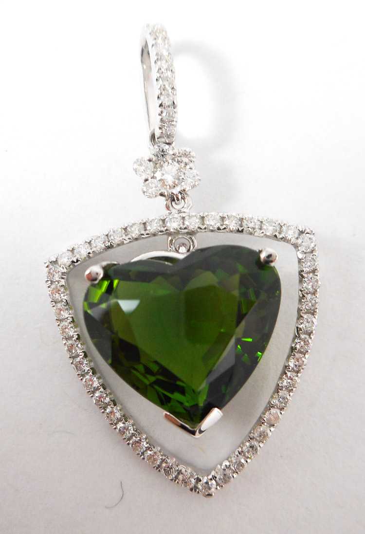 Appraisal: GREEN TOURMALINE AND DIAMOND PENDANT k white gold with round-cut