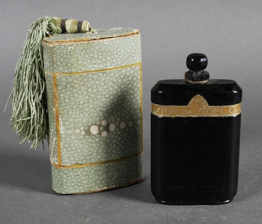 Appraisal: Caron Nuit de Noel opaque black glass perfume bottle with