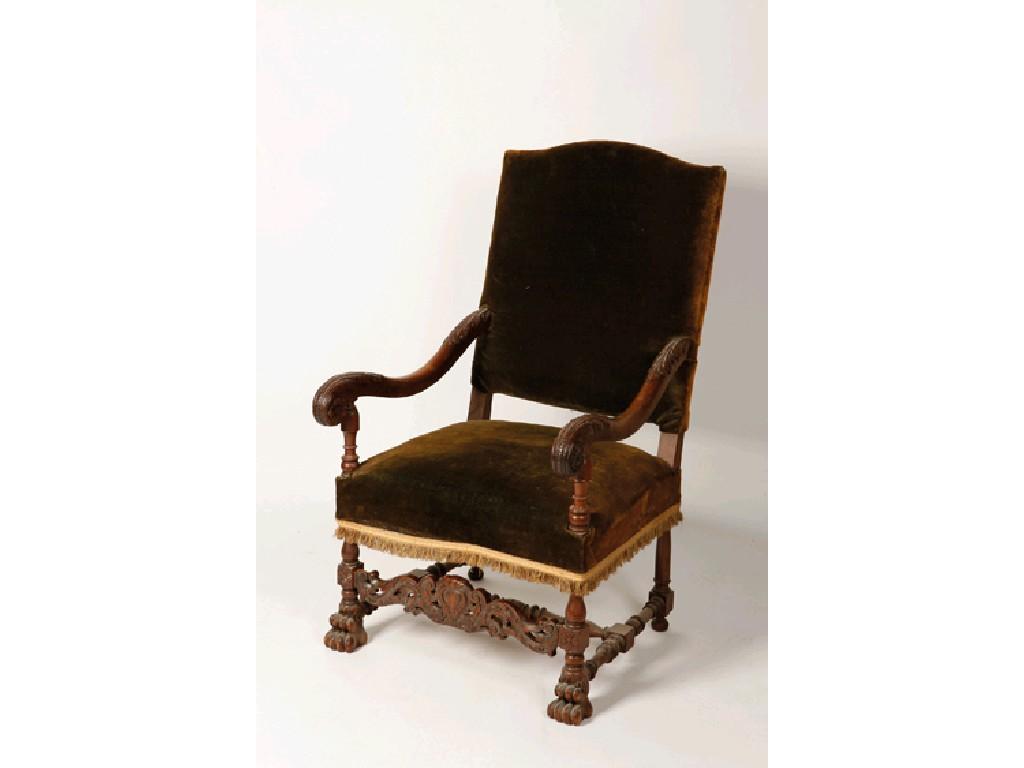 Appraisal: A WILLIAM AND MARY STYLE WALNUT FRAMED ARMCHAIR the raised