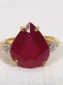 Appraisal: An carat gold ruby and diamond ring the heart shaped