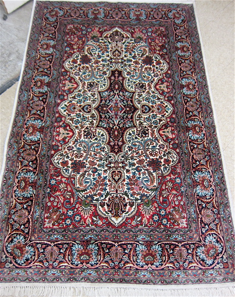 Appraisal: FINE HAND KNOTTED ORIENTAL AREA RUG Indo-Persian floral and central