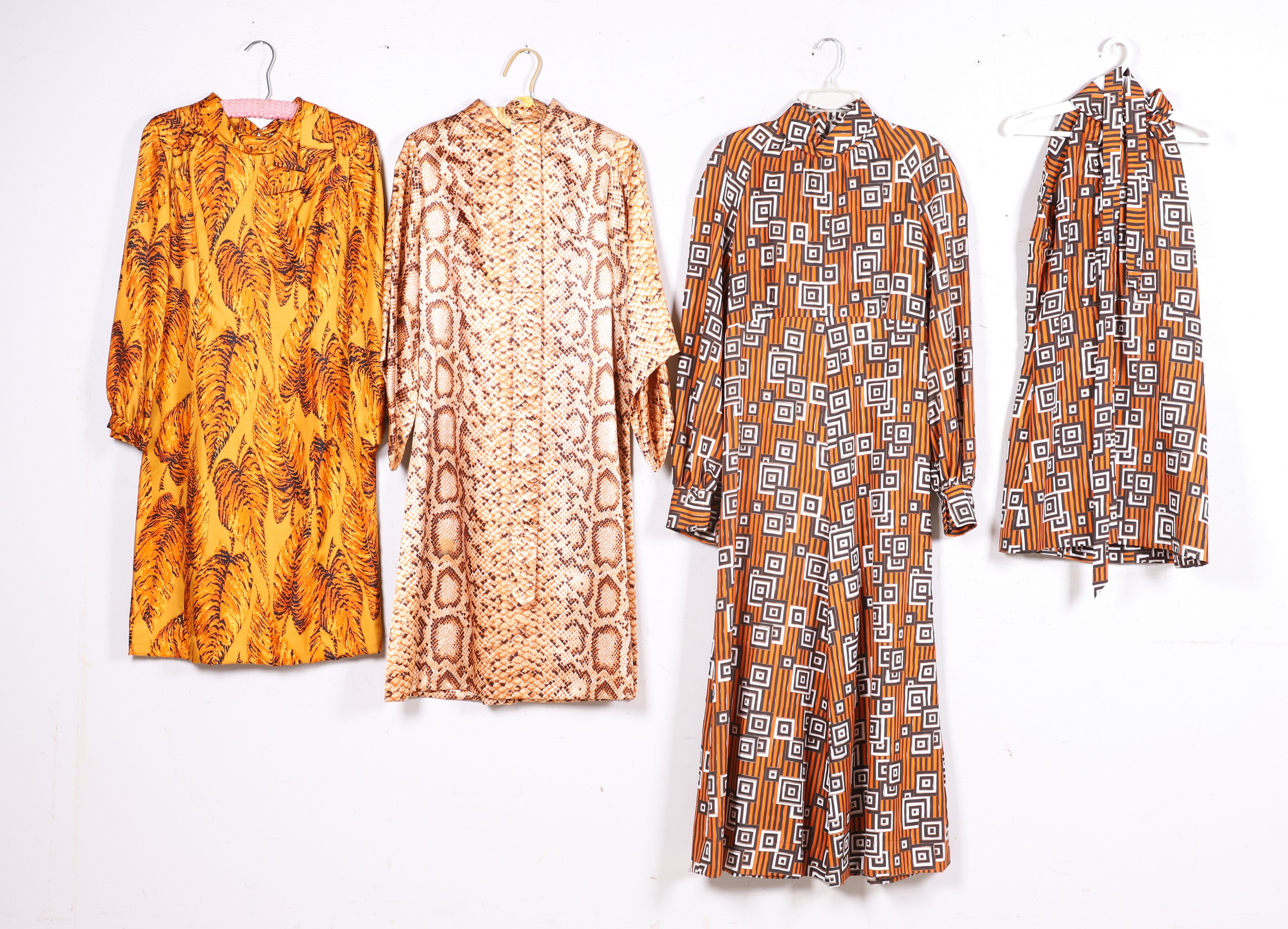 Appraisal: Geo and Animal patterned dresses and jumpsuit to include Sandra