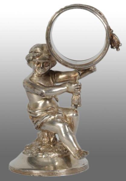 Appraisal: Draped Cherub on Stump Figural Napkin Ring Description Marked Reed