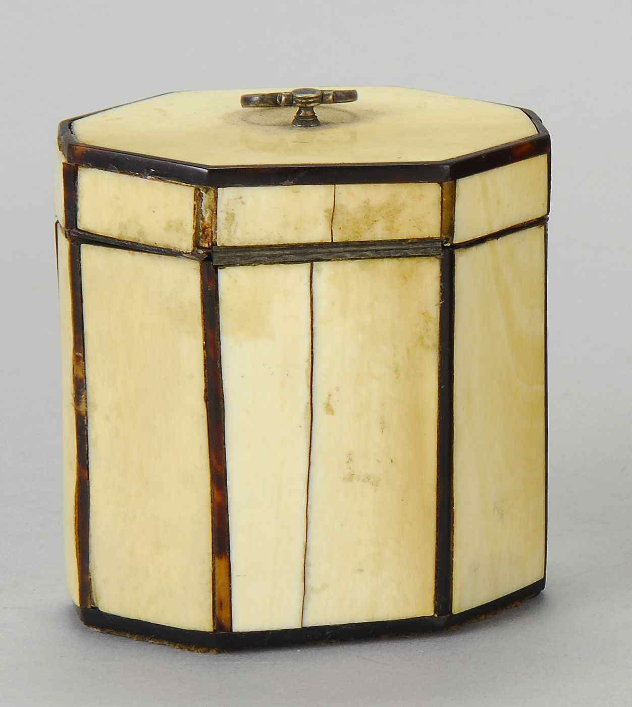 Appraisal: ANTIQUE ENGLISH IVORY-MOUNTED WOODEN TEA CADDY th CenturyIn octagonal form