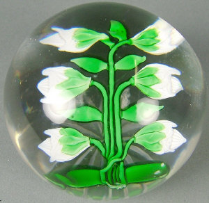 Appraisal: Baccarat white Tulip-bud paperweight with six buds and seven leaves