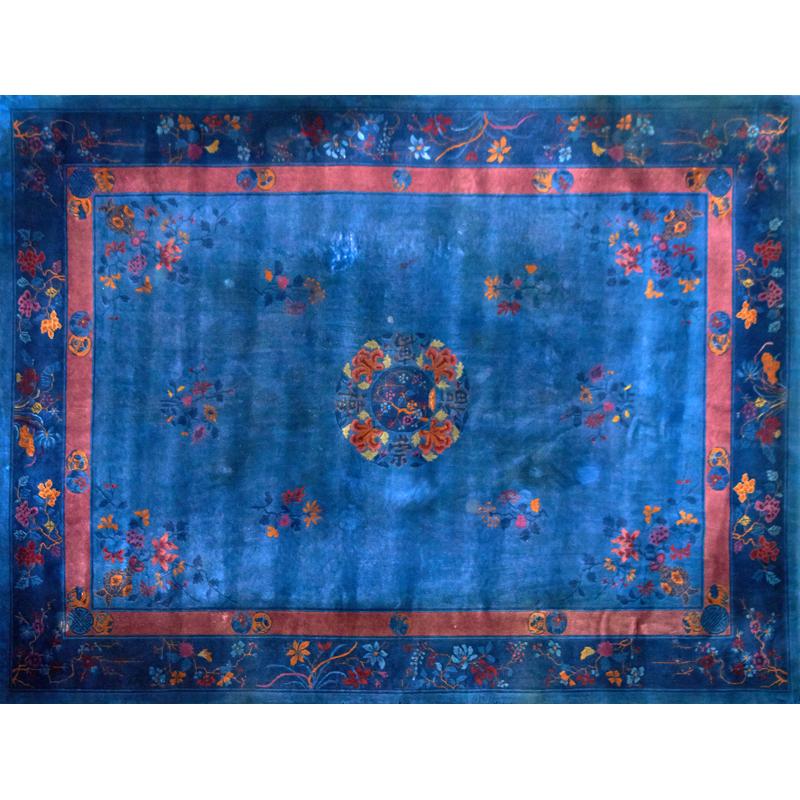 Appraisal: CHINESE PEKING RUG Floral and vine design on blue ground