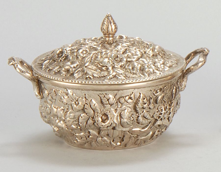 Appraisal: KIRK STERLING SILVER COVERED TWO-HANDLED BOWL In repousse floral decoration